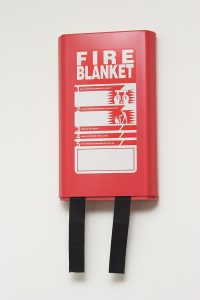 A Wall Mounted Fire Blanket